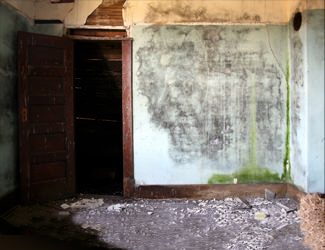 a fire and flood damaged home in Goshen during major area flooding